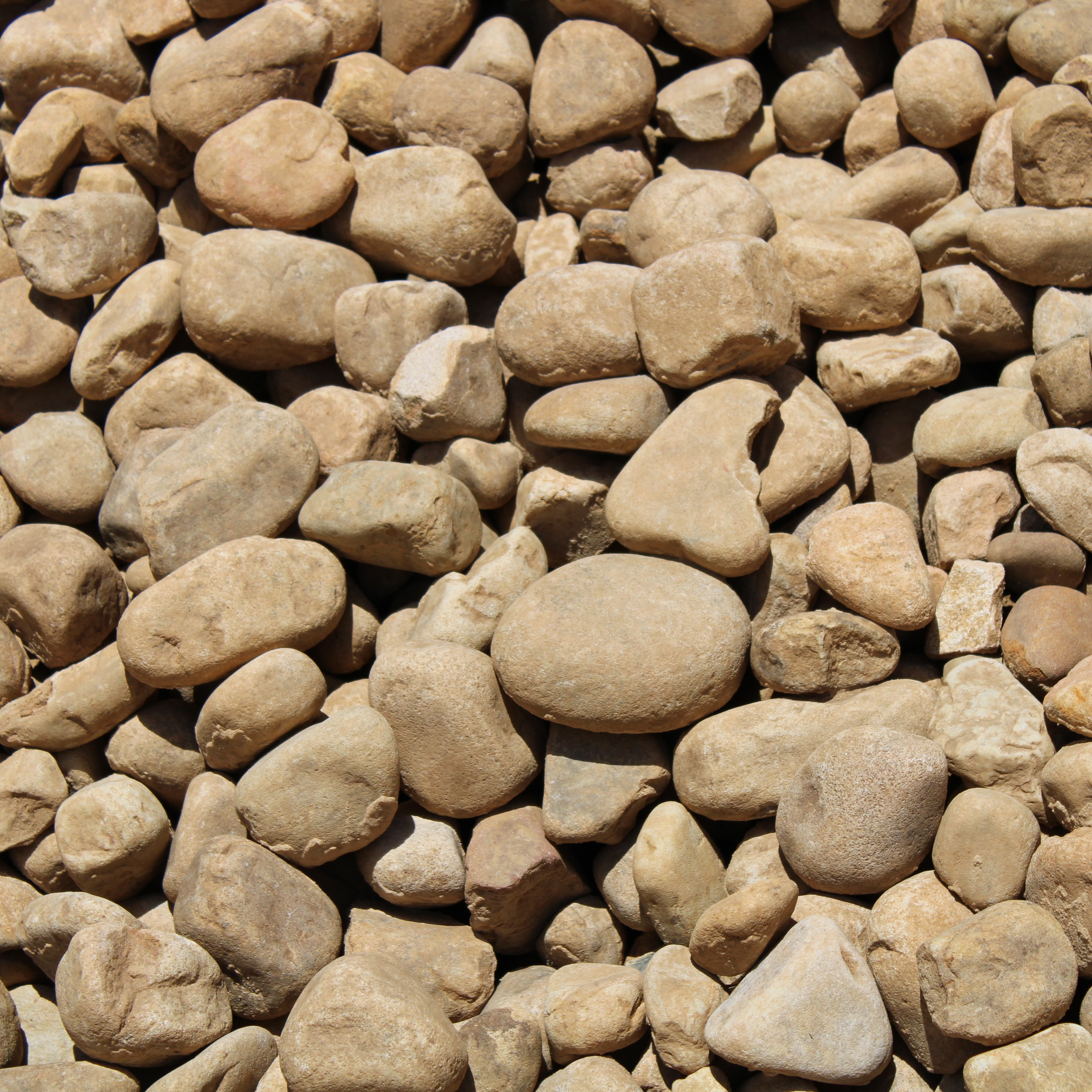 RIVER ROCK BULK 2-4 INCH (lb/ton)